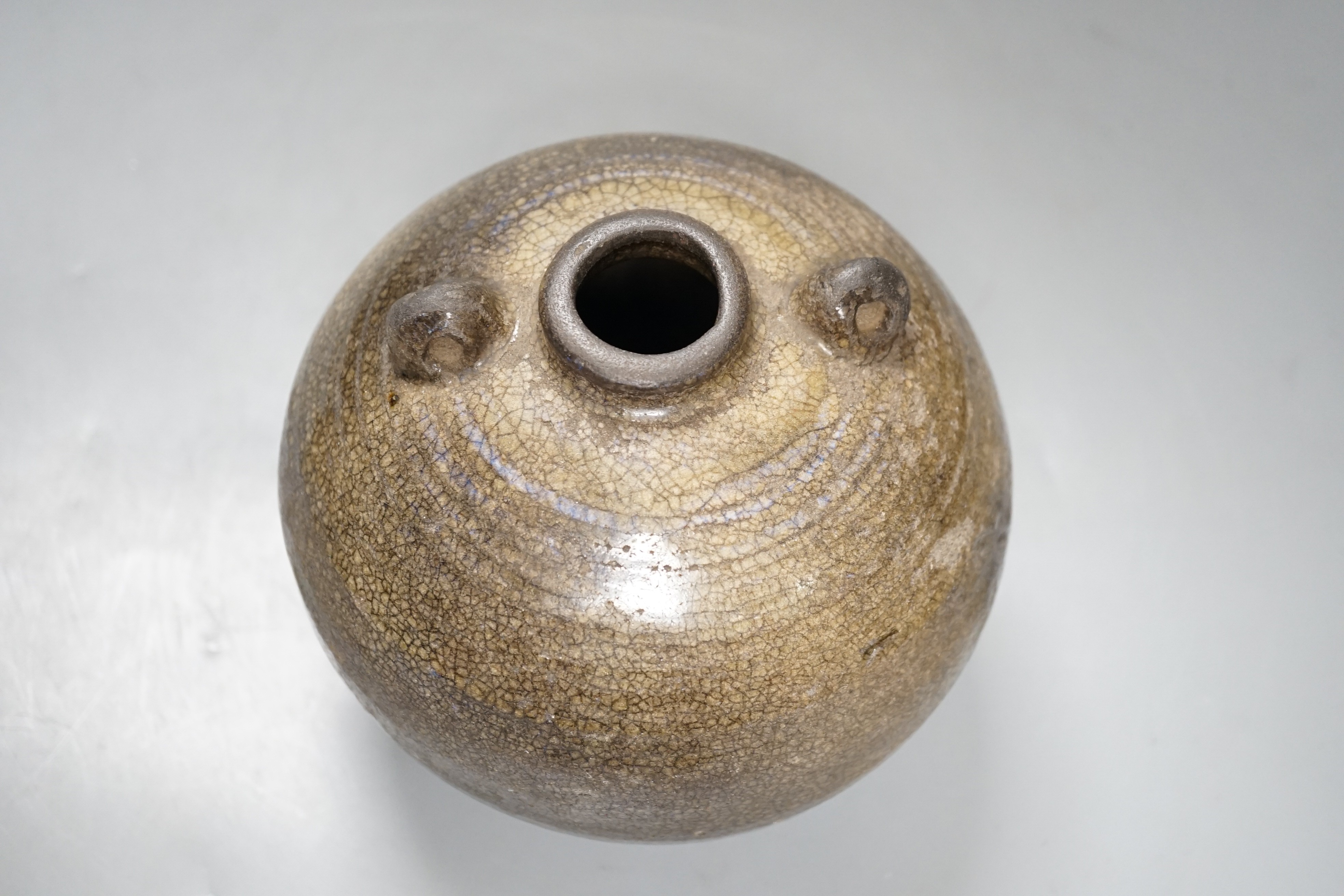 A South East Asian two-handled stoneware jar, possibly Annamese, 15th/16th century, 14cm